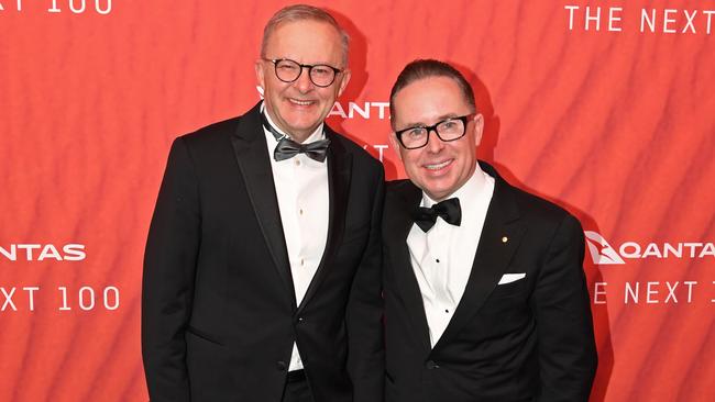 Anthony Albanese stands with Qantas CEO Alan Joyce as they attend the Qantas 100th Gala Dinner at Jetbase 96 hangar at Sydney's International Airport on March 31, 2023 in Sydney, Australia. (Photo by James D. Morgan/Getty Images)