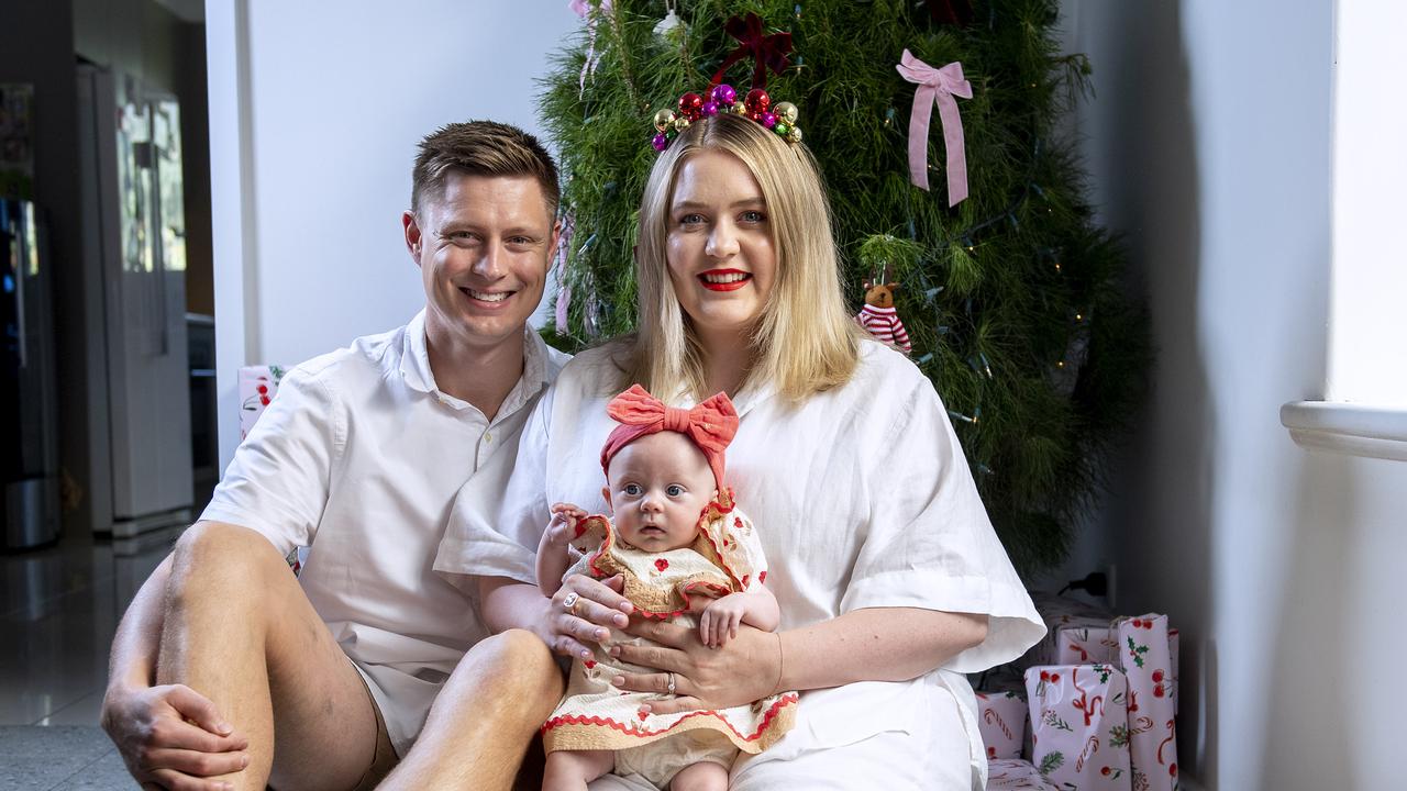 Hannah and Simon Potts with Cutest Spring Baby winner Poppy in front of their Christmas tree at their Klemzig home. Picture Mark Brake