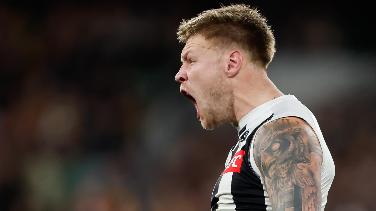 MELBOURNE, AUSTRALIA - AUGUST 5: Jordan De Goey of the Magpies celebrates a goal during the 2023 AFL Round 21 match between the Hawthorn Hawks and the Collingwood Magpies at Melbourne Cricket Ground on August 5, 2023 in Melbourne, Australia. (Photo by Dylan Burns/AFL Photos via Getty Images)