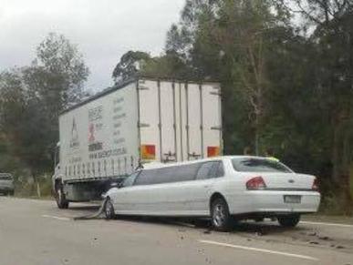 The limo wedged under the truck. Photo: Mark Cowan