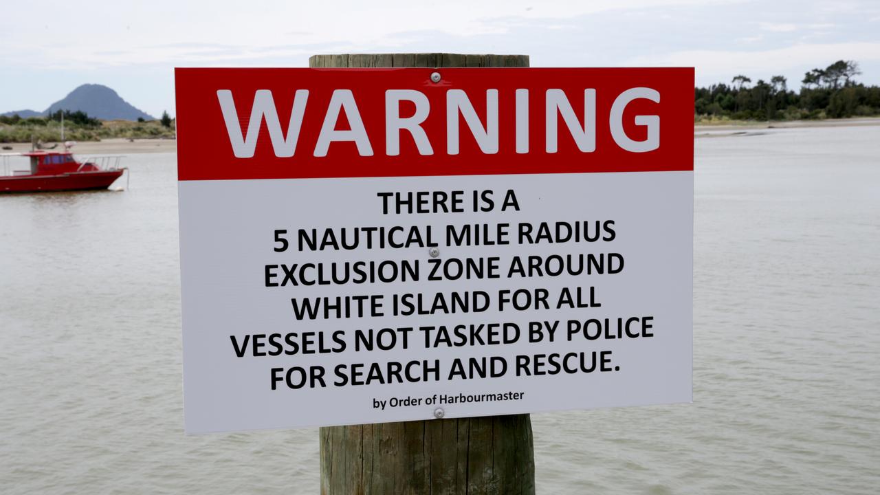 A sign warning of the White Island exclusion zone. Picture: AAP Image/David Rowland.