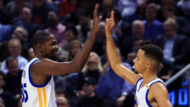 Kevin Durant #35 and Steph Curry #30 of the Golden State Warriors.