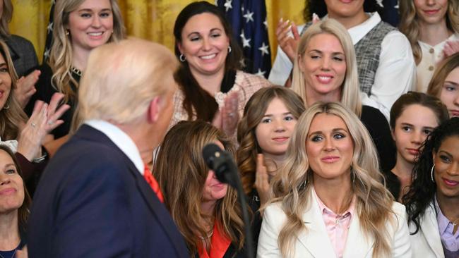 Donald Trump acknowledges former Kentucky swimmer Riley Gaines before signing the No Men in Women's Sports Executive Order into law. Picture; AFP.