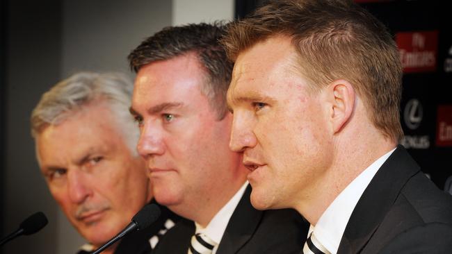 From left, Malthouse, McGuire and Nathan Buckley at the ‘handover’ announcement.