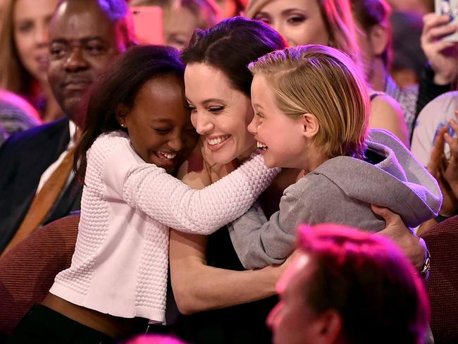 Angelina Jolie pictured with two of her children, Zahara and Shiloh after winning an award for Favourite Villain in 'Maleficent' during Nickelodeon's 28th Annual Kids' Choice Awards. Picture: Kevin Winter/Getty Images