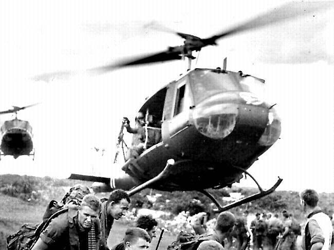 Members of 5 Platoon, B Company 7th RAR await evacuation from Vietnam by American helicopters. Picture: Australian War Memorial