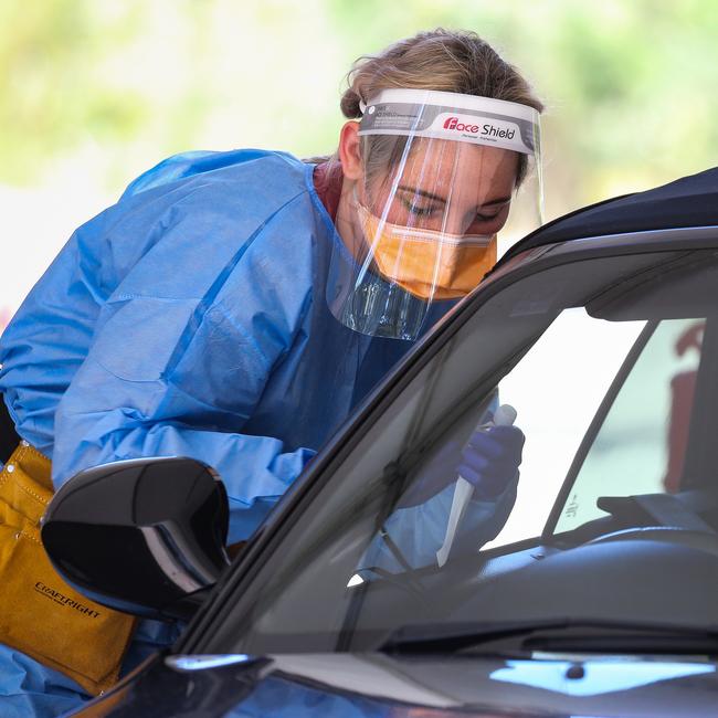 SYDNEY, AUSTRALIA – NewsWire Photos, SEPTEMBER, 20 2021: Nurses are seen conducting Covid-19 Tests at the Willoughby Drive Through testing Clinic in Sydney. Picture: NCA NewsWire / Gaye Gerard