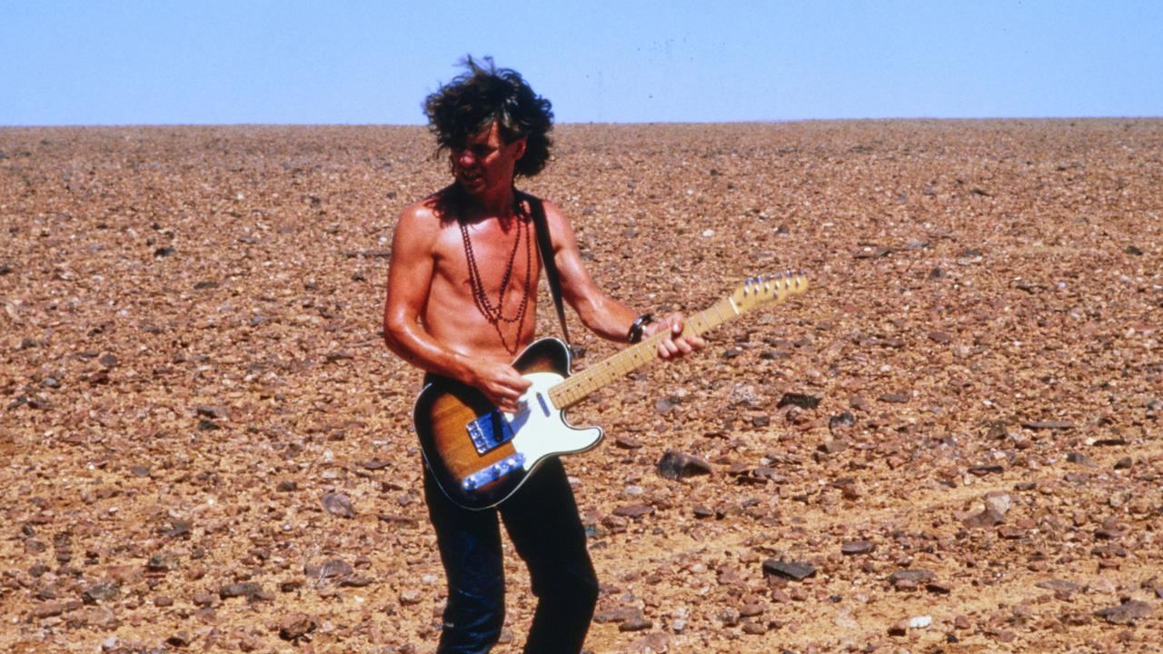 Guitarist Tim Farriss in the outback for Kiss The Dirt video shoot. Picture: Supplied.