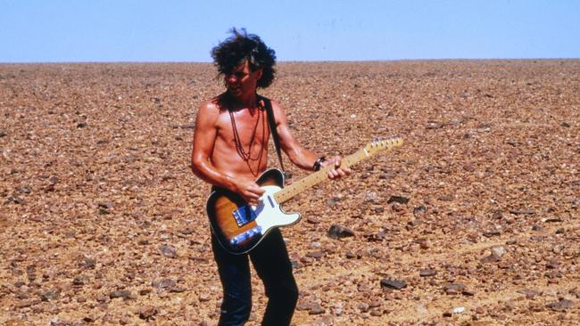 Guitarist Tim Farriss in the outback for Kiss The Dirt video shoot. Picture: Supplied.