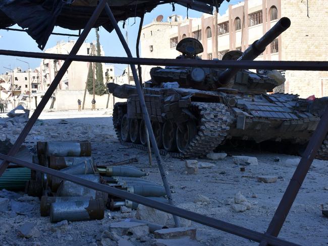 A Russian-built tank amid the rubble of the Syrian civil war. Two units of Russian mercenaries have reportedly been destroyed. Picture: AFP