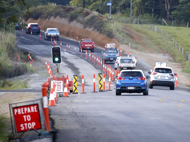 Traffic waits at the roadworks  on the Bruce Highway north of Innisfail near the Eubanangee Rd which were due for completion  by mid 2017  which are still not finished . The upgrade is part of the Ingham to Cairns pavement widening . PICTURE: ANNA ROGERS