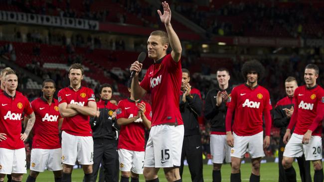 Manchester United's Nemanja Vidic waves goodbye.