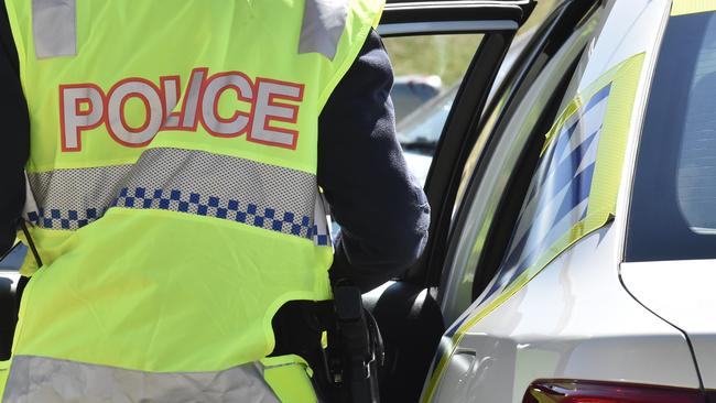 Multiple police cars surrounded the vehicle about 11.30am near the Smith St exit on Friday morning. Photo Bev Lacey (file)