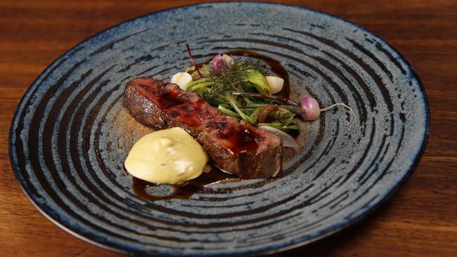 Wagyu oyster blade, baby turnips, bearnaise and jus. Picture: AAP/Josh Woning