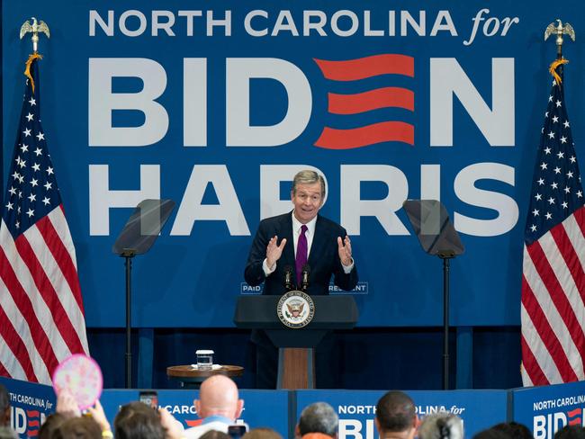 North Carolina Governor Roy Cooper will continue to campaign for Ms Harris but has removed himself from contention to become her Veep. Photo: AFP