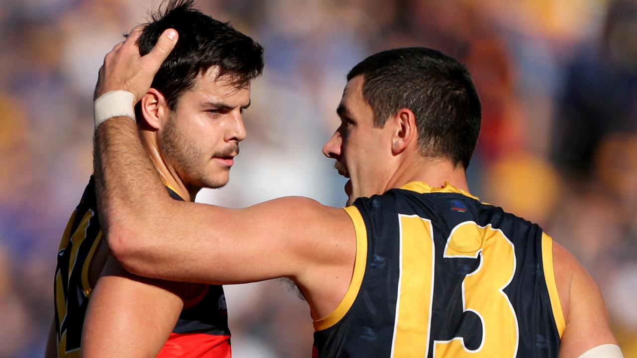 Walker revs up Darcy Fogarty after a goal last year. Picture: AAP