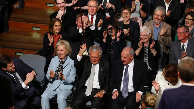 Former ALP Prime Ministers — Bob Hawke raises his walking stick, seated next to Paul Keating and Julia Gillard in the front row as Labor Leader Bill Shorten delivers his campaign speech last year in Sydney. Blanche d’Alpuget is beside Hawke. Picture: Britta Campion