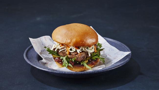 Quack Daddy one of the duck burgers from Manu Feildel's new restaurant, Duck In Duck Out. Picture: Rob Palmer