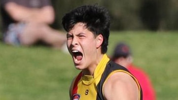 Josh Lai celebrates one of his two semi final goals this September. Picture: Andrew Keech.