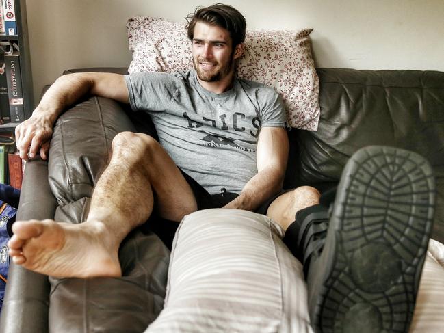 Western Bulldogs premiership captain Easton Wood at home this afternoon after having surgery on his injured ankle . 7th October 2016. Picture: Colleen Petch