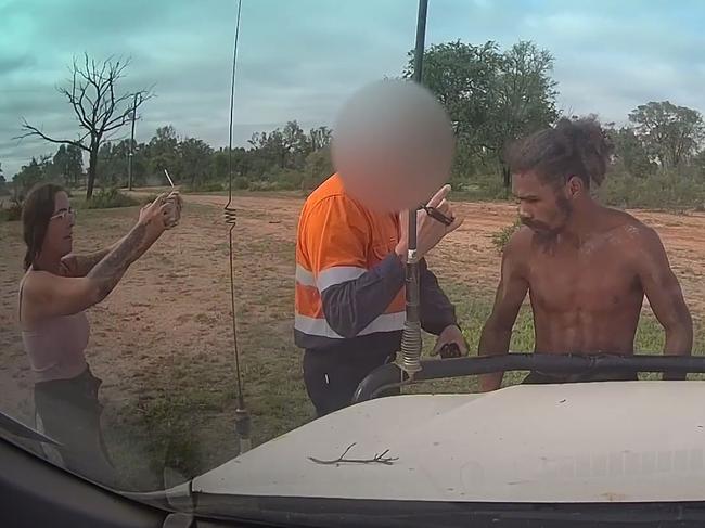 An activist shouts obscenities at a female Adani worker in protest on the site. Picture: Supplied