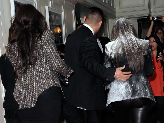 Kim Kardashian is covered in flour during arrivals at the "True Reflection" Fragrance Launch at The London West Hollywood in 2012. Picture: Getty