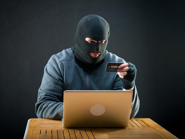 Hacker pay for goods in online store with a stolen credit card. credit card fraud generic, scammers, theft