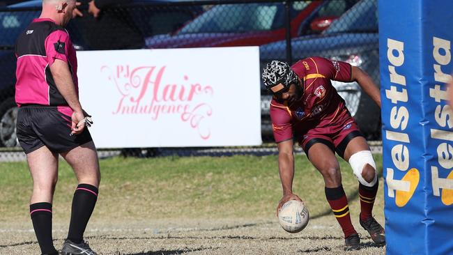 Maciu Masirewa scores for Thirlmere Roosters. Picture: Steve Montgomery.