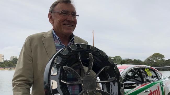 Larry Perkins with the trophy named in his honour.