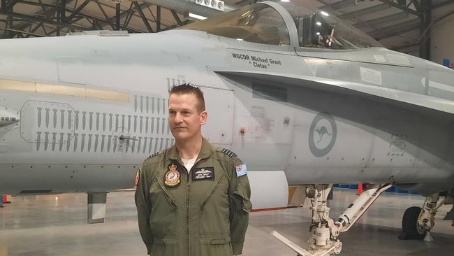 Group Captain Michael "Cleetus" Grant has flown fighter jets for more than 20 years. The F/A-18A donated to the Australian War Memorial will bear his name. Picture: Craig Dunlop