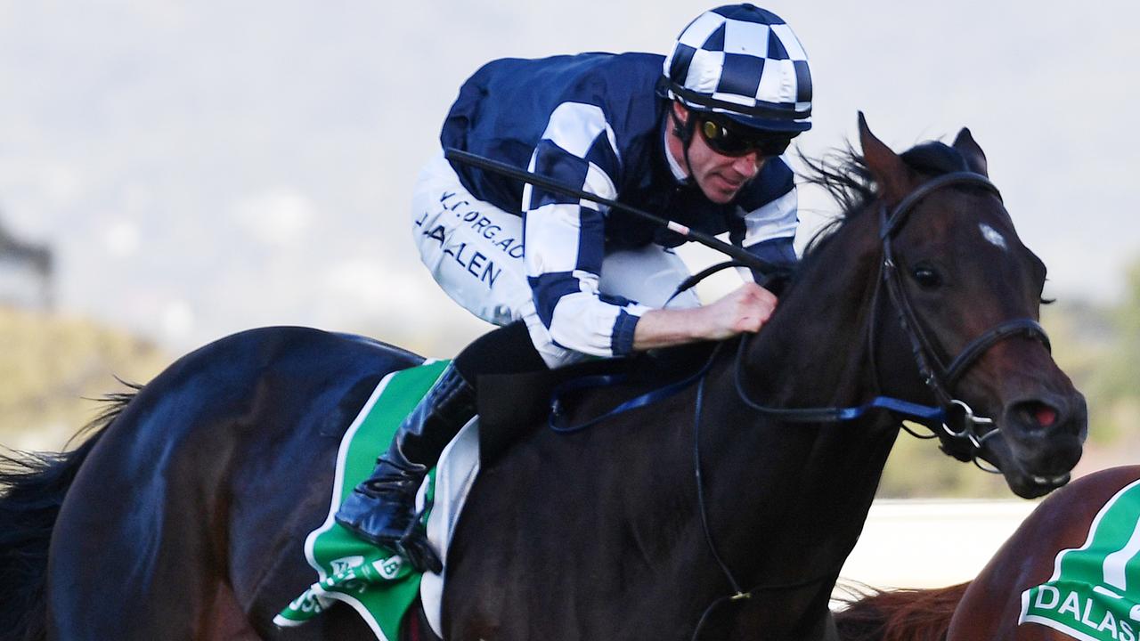 Jockey John Allen rides Russian Camelot to victory in race 8, South Australian Derby at Morphettville Racecourse in Adelaide, Saturday, May 9, 2020. (AAP Image/David Mariuz) NO ARCHIVING, EDITORIAL USE ONLY