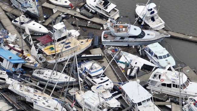 Ten year anniversary of Cyclone Yasi. Severe Tropical Cyclone Yasi 2011. Port Hinchinbrook aerial view of luxury yachts and boats that bore the brunt of the destructive winds and storm surge. Picture: Evan Morgan