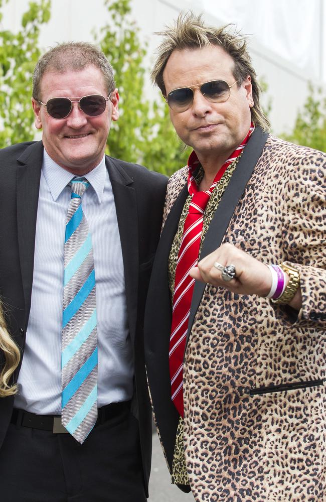 Ricky Nixon and Warwick Capper in the Birdcage at the 2014 Melbourne Cup. Picture: Sarah Matray