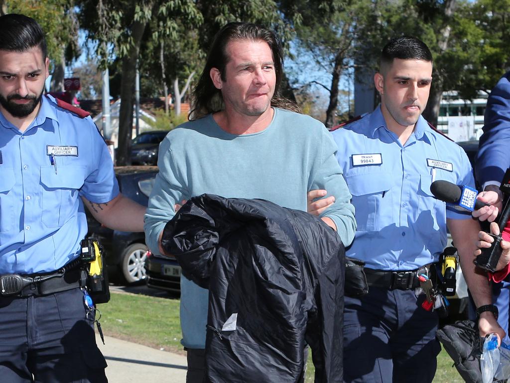 Ben Cousins arrives at a courthouse.