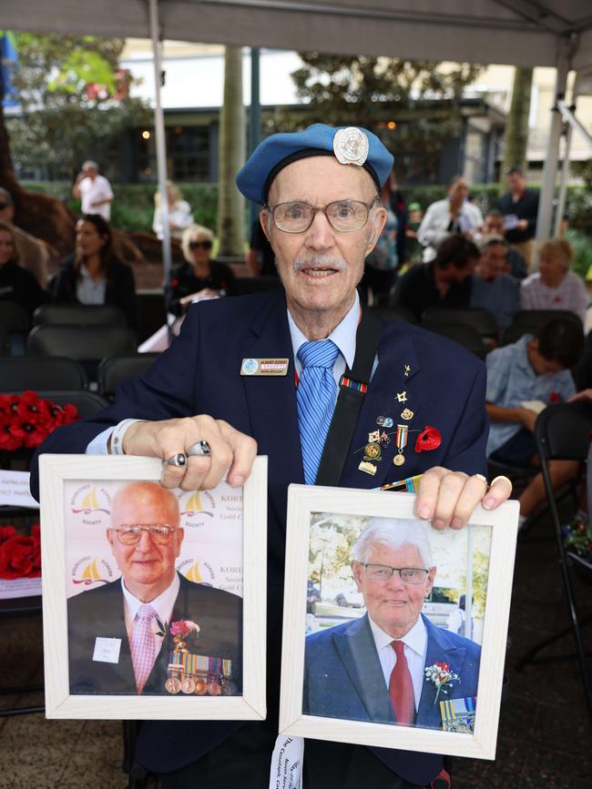 Albert Eddie Grocott holding space for John Fry (right) and Eric Mayo (left) at the Surfers Paradise RSL Anzac Day noon service 2025 at Cavill Park for Gold Coast at Large. Picture, Portia Large.
