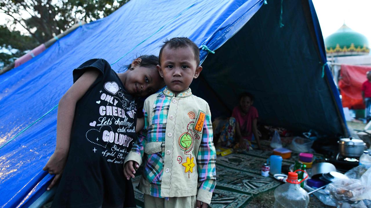 Children are forced to live in a tent in Palu, Indonesia, after an earthquake and tsunami hit the area in September, 2018. Picture: AFP