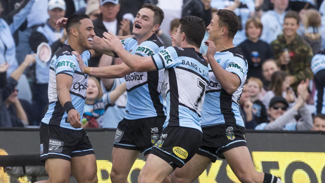 Valentine Holmes celebrates with Sharks teammates after breaking the Cronulla try-scoring record. Picture: AAP