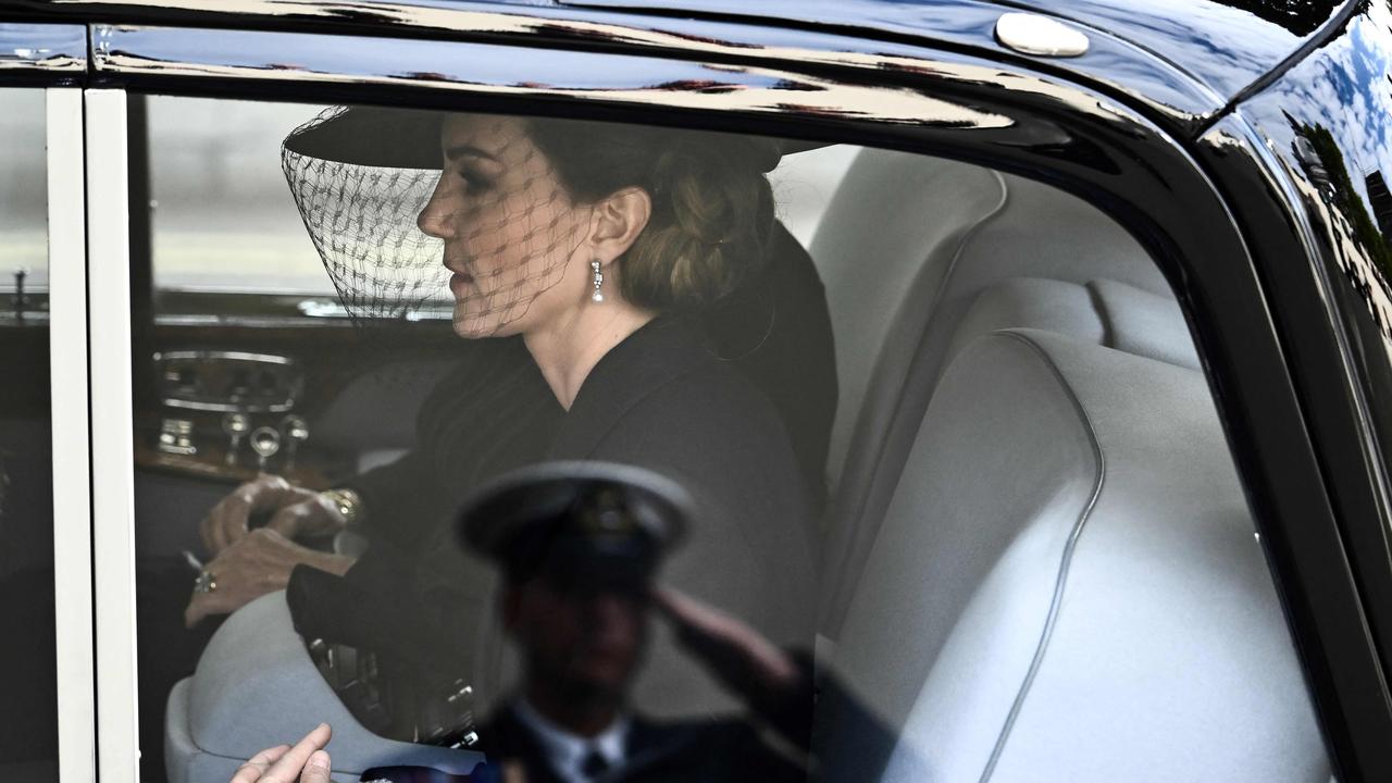 Britain's Catherine, Princess of Wales, sits in her car as she leaves Westminster Abbey in London.