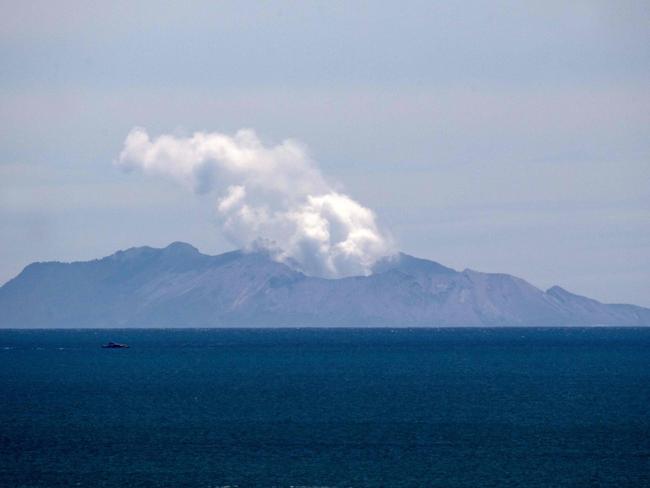 (FILES) Steam rises from the White Island volcano following the December 9 volcanic eruption, in Whakatane on December 11, 2019. The New Zealand firm that managed a volcanic island which erupted killing 22 people in 2019, was on October 31, 2023 found guilty of failing to adequately protect visitors. (Photo by Marty MELVILLE / AFP)