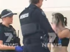 There has been a dramatic arrest at Kilkenny after a 31-year-old man was run over by a ute at a Hanson Road service station., The victim's friend, a 27-year-old Loxton woman, was arrested at the scene for disorderly behaviour. Picture: 7NEWS