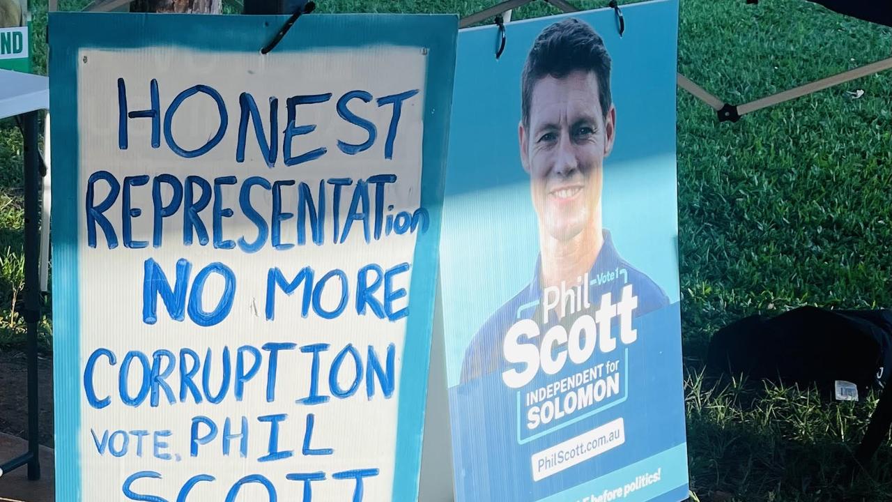 An unauthorised repurposed election poster next Phil Scott’s authorised corflute