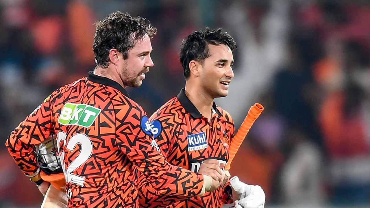 Sunrisers Hyderabad's Travis Head (L) and Abhishek Sharma celebrate their win against Lucknow Super Giants.