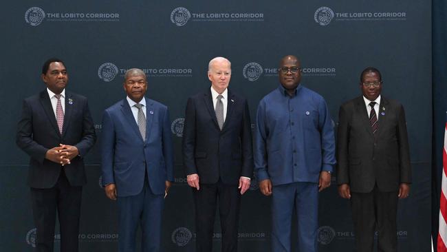 Zambian President Hakainde Hichilema, Angola President Joao Lourenco, US President Joe Biden, Democratic Republic of Congo (DRC) President Felix Tshisekedi, and Tanzania Vice-President Philip Isdor Mpango pose for a family photo ahead of the Lobito Corridor Trans-Africa Summit at the Carrinho Food Processing Factory near Benguela.