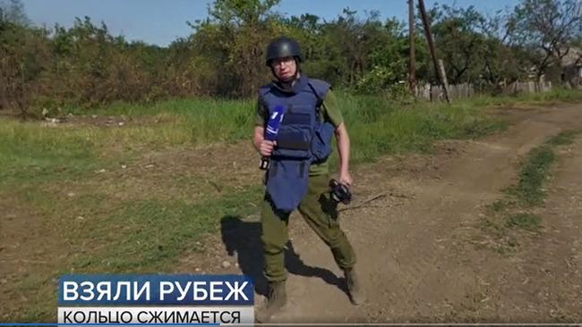 A Russian Channel One reporter in the field.