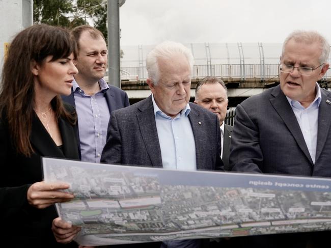 Prime Minister Scott Morrison with Robertson federal Liberal MP Lucy Wicks, Dobell Liberal candidate Dr Michael Feneley. Picture: Adam Taylor