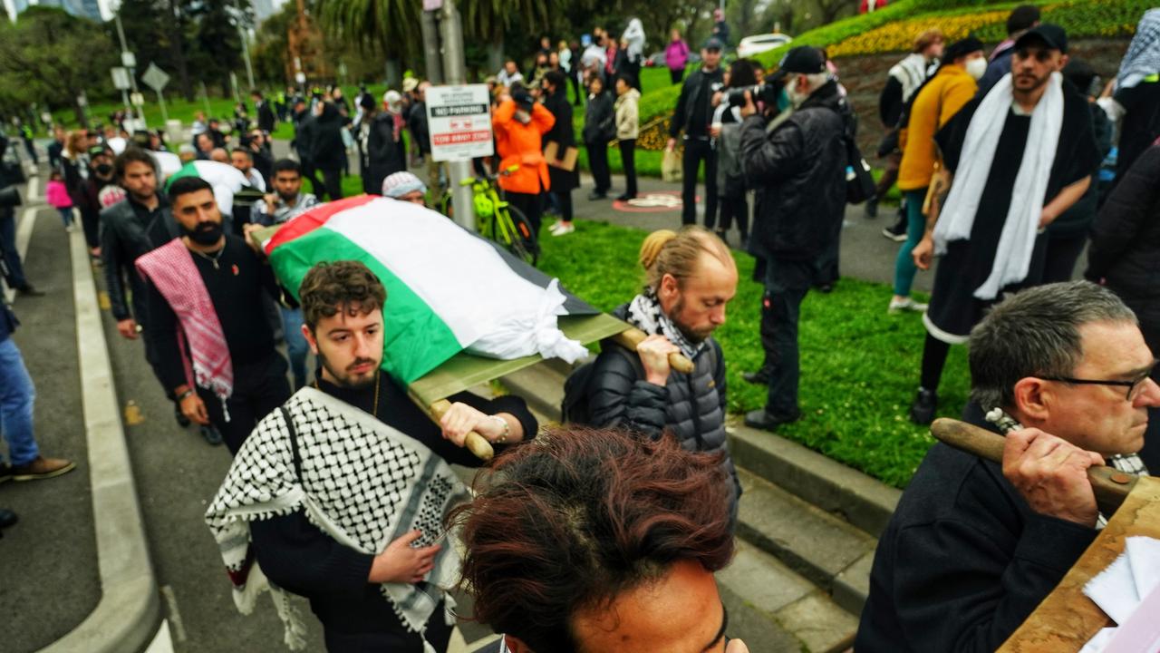 In Melbourne, Palestinian communities silent procession on St Kilda Road to honour loved ones lost in Gaza. Picture: NewsWire / Luis Ascui