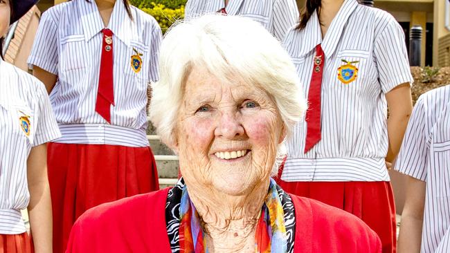 Dell Rathbone poses for a photograph at West Moreton Anglican College with students Ellen Georges Jr Cheng, Rachael Lin, Paranee Chutipongpattanakul, Joy Jiayi Lin, Daisy Zhirus Zhao and John Kim, Karrabin, Friday, October 9, 2020 - Picture: Richard Walker