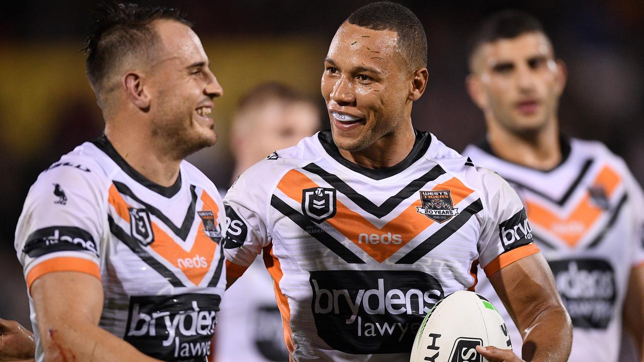 Moses Mbye celebrates with Josh Reynolds