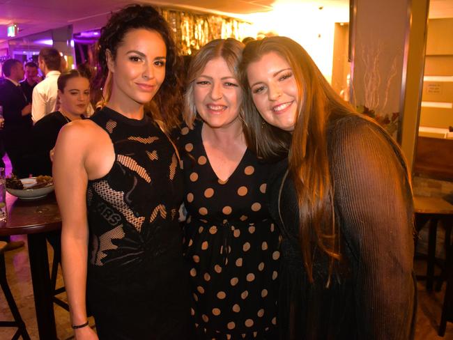 Laree Fahy, Jo Lay and Tara Whelan having a great night at the Cowwarr Saints Football &amp; Netball Club Golden Gala Ball 2024. Picture: Jack Colantuono