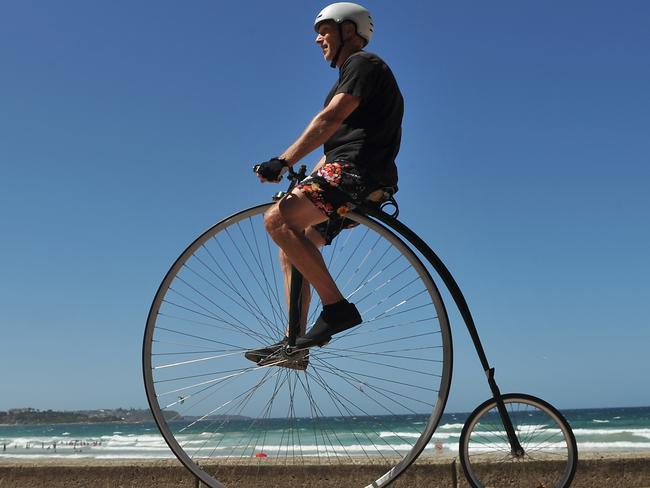 Hugh MacLaurin is training for an upcoming penny farthing race on Feb 23. He has one of his vintage bikes for the photo.